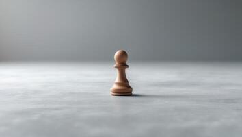 A small wooden chess piece on a table photo