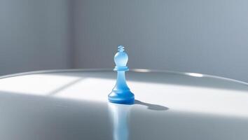 A blue chess piece sitting on a table photo