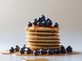 Stack of Fluffy Pancakes Drizzled with Syrup and Topped with Fresh Blueberries photo