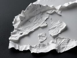 A piece of white paper with a hole in it photo