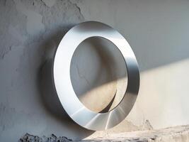 A circular metal object on a wall photo