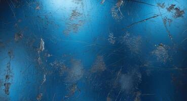 A blue metal texture with scratches and scratches photo