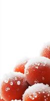 A pile of red tomatoes with ice on top photo