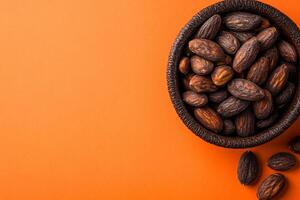 Top View Of Roasted Almonds On Vibrant Background With Copy Space, Food Setting photo