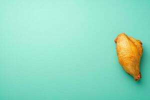 Top View Of Roasted Pheasant With Chestnut Stuffing On Vibrant Background With Copy Space, Food Image photo