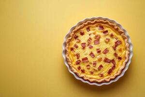 Top View Of Quiche Lorraine With Gruyere On Vibrant Background With Copy Space, Cuisine Photography photo