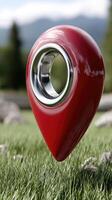A red pin with a metal ring on it photo