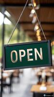 Open sign hanging from a restaurant photo