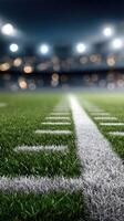 American football field with white lines and lights photo