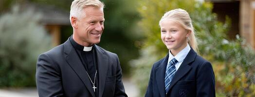 A man and a young girl in school uniforms photo