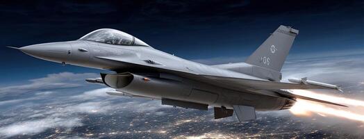 A fighter jet flying through the air photo