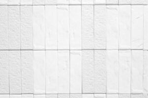 Close up of White Tile pattern Texture Wall for Background. photo