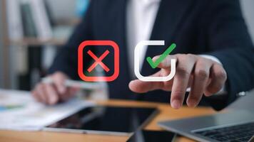 Businessman select green correct sign mark for approve business project proposal concept, Goals achievement and business success. Task completion, Approve and reject business project proposal concept. photo