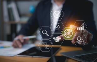 Goal Achievement The path to success, Target Plans and Business Strategies and Competitive Advantage, Businessman hand touching target icon Business Growth and Vision, Banking and Finance. photo