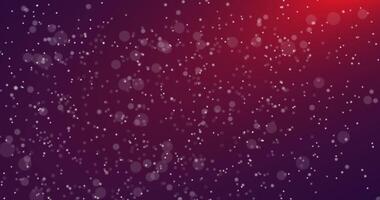 Falling particles. Bokeh. Abstract snow. Colored background.1 video