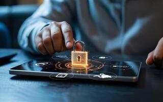 A man using a tablet with a padlock on it photo