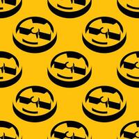 Seamless pattern with radiation symbols in circular frames on a yellow background. Bold and minimal design with negative space for science, nuclear, or danger-related projects. vector