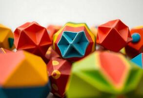 group of colorful origami balls on a table photo