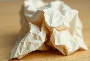 close up of a paper ball on a table photo