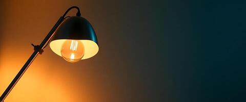 lamp that is on a table next to a wall photo