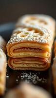 close up of a stack of pastries on a plate photo