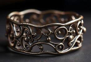 close up of a metal bracelet on a table photo