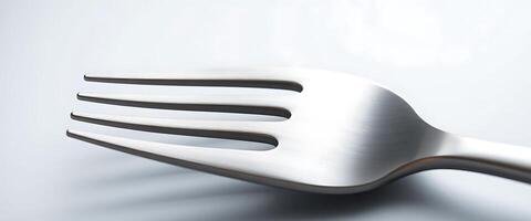 close up of a fork on a table photo