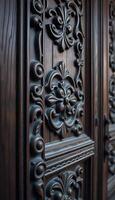 close up of a wooden door with ornate carvings photo