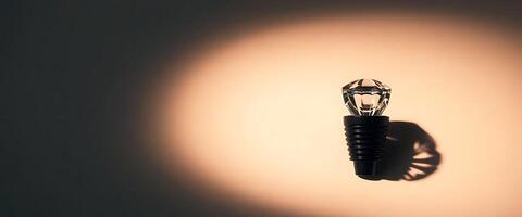 light bulb is casting a shadow on a wall photo
