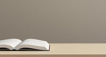 An open book on a table with a gray background photo