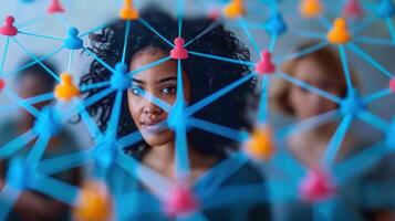 A woman looks through a vibrant network representing global connections and ideas. photo