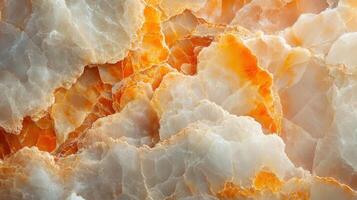 A close-up view reveals a beautiful marble texture with contrasting orange and white tones. photo