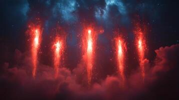 Vibrant red fireworks explode upwards from the clouds, illuminating the night sky with a fiery glow. photo