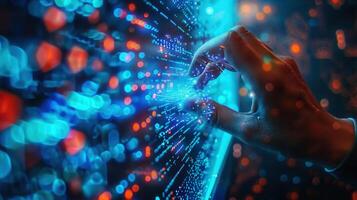 A person's hand interacts with a bright digital interface representing modern technology photo