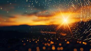 Dramatic sunset with the sun shining brightly over a blurred, bokeh-filled landscape. photo
