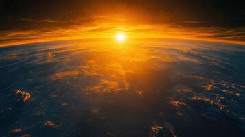 Stunning view of Earth at sunset, with a vibrant golden sun setting over the horizon. photo