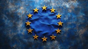 The European Union flag features a circle of gold stars, symbolizing unity and harmony. photo