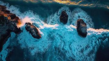 Stunning aerial view of powerful ocean waves crashing against coastal rocks. photo