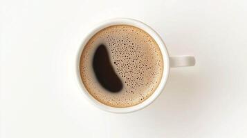 Warm coffee cup with heart foam on white background for cozy morning vibes photo