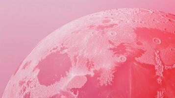 Surreal pink moon surface with textured craters in abstract chaos photo