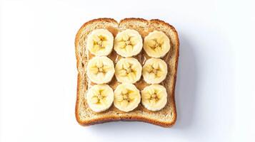 Delicious whole wheat toast with peanut butter and banana slices for a nutritious breakfast photo