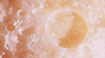 Abstract cosmic peach texture with chaotic moon surface design for creative projects photo