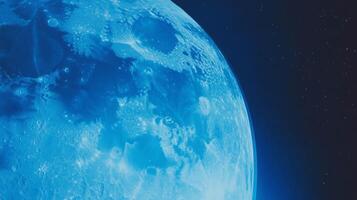 Vibrant cyan moon texture against starry night sky photo