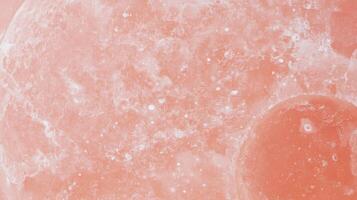 Abstract peach moon texture with chaotic patterns for background design photo