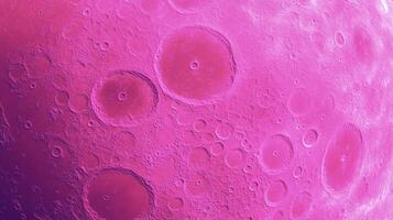 Vibrant magenta moon surface texture with chaotic crater pattern photo