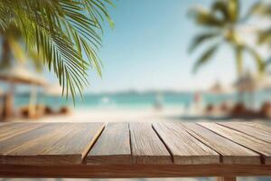 Wooden table top on beach with palm trees photo