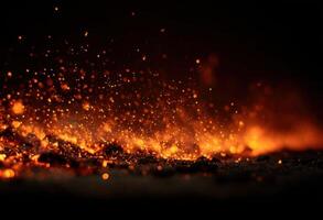 A close up of a fire with sparks and flames photo