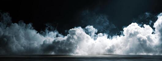 A large cloud of water is seen in the dark photo