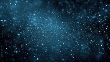 Blue background with stars and snow falling photo