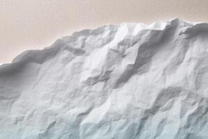 A close up of a piece of paper with a mountain in the background photo